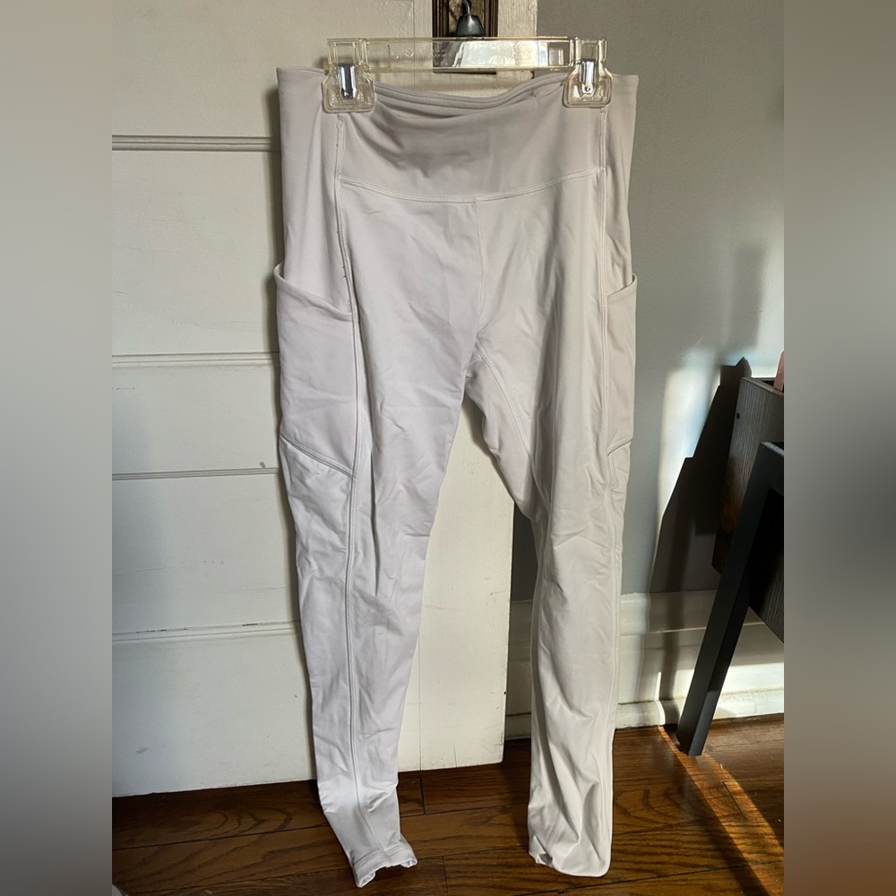 Lululemon 25” Wunder Under with pockets size 6